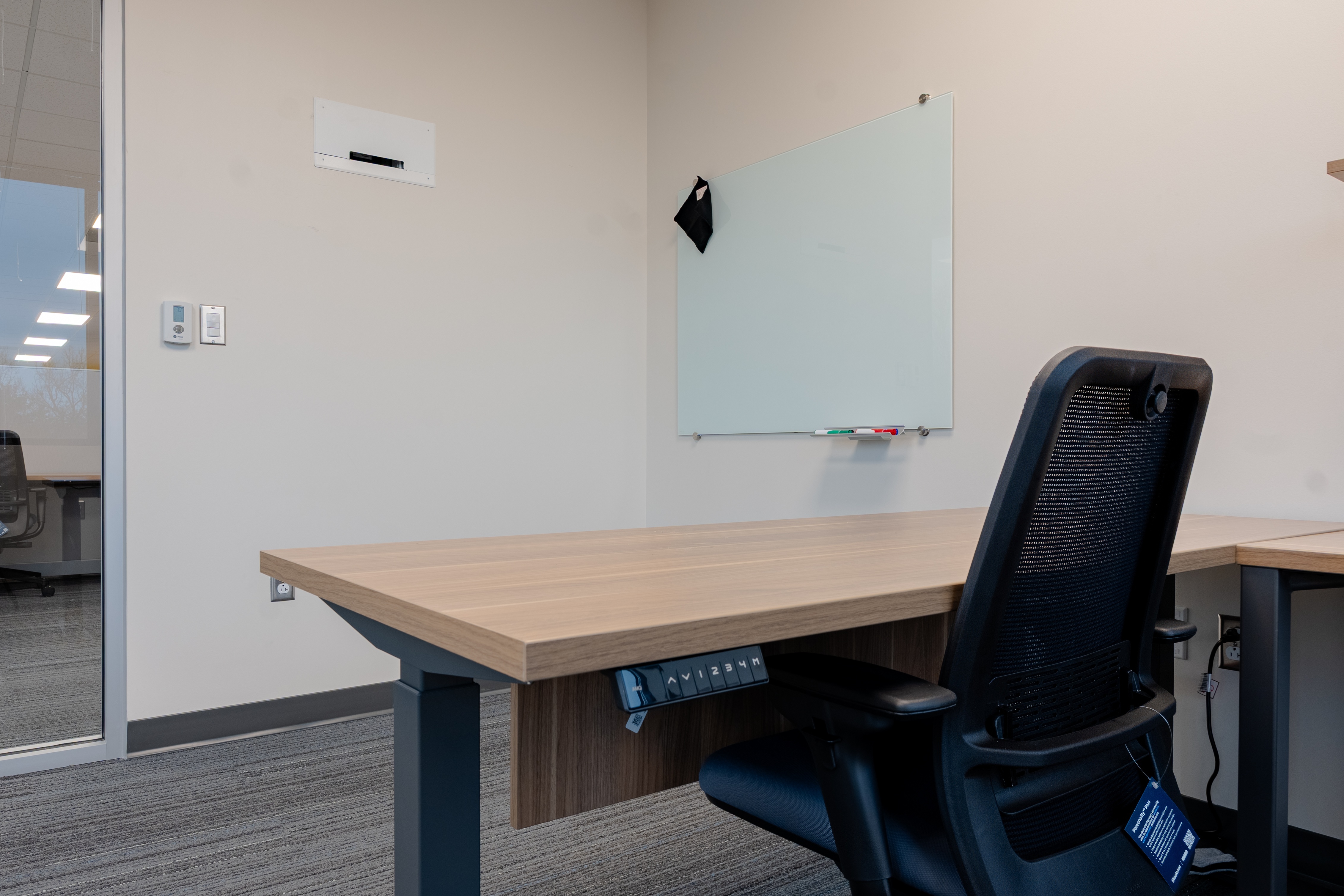 Workspace installation detail with office seating